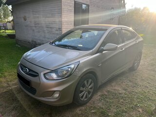 2011 Hyundai Solaris I, бежевый, 620000 рублей, вид 1