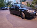 2010 Kia Rio II Рестайлинг, чёрный, 320000 рублей - вид 1
