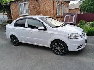 2011 Chevrolet Aveo I Рестайлинг, белый, 555000 рублей, вид 2