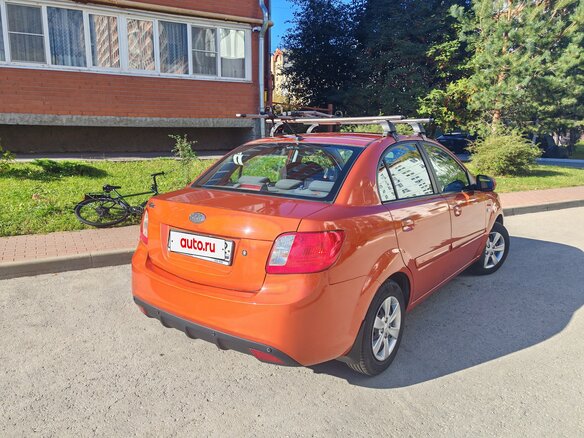 2011 Kia Rio II Рестайлинг, оранжевый, 490000 рублей - вид 9