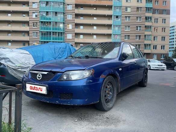 1998 Mazda 323 VI (BJ), синий, 100000 рублей