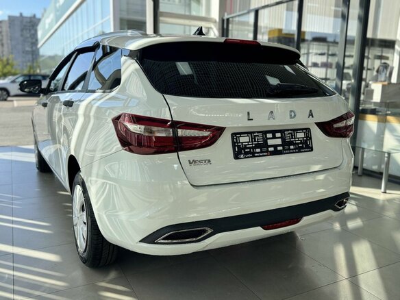 2026 Lada (ВАЗ) Vesta SW I Рестайлинг (NG), белый - вид 2