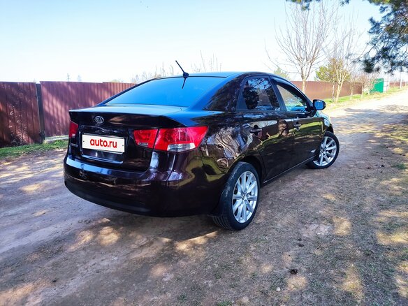 2010 Kia Cerato 6-speed II, пурпурный, 700000 рублей - вид 4