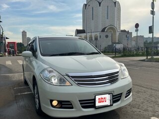 2010 Nissan Tiida I, белый, 990000 рублей, вид 4