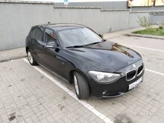 2012 BMW 1 серии 118i II (F20/F21), чёрный, 887486 рублей, вид 1
