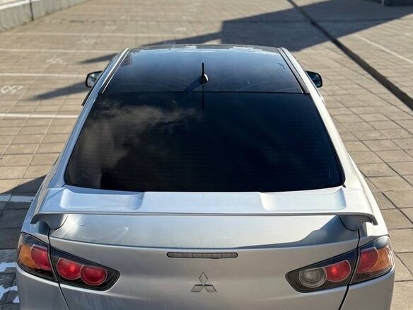 2011 Mitsubishi Lancer X Рестайлинг, серебристый, 660000 рублей - вид 4