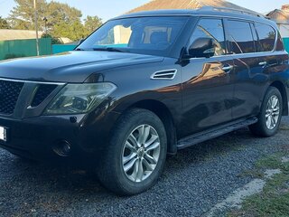2011 Nissan Patrol VI (Y62), пурпурный, 1750000 рублей, вид 1