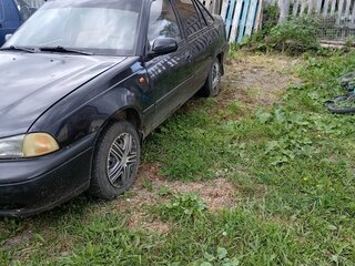 2008 Daewoo Nexia I, чёрный, 100000 рублей, вид 1