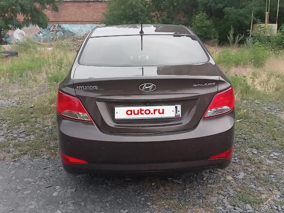 2015 Hyundai Solaris I Рестайлинг, коричневый, 880000 рублей - вид 5