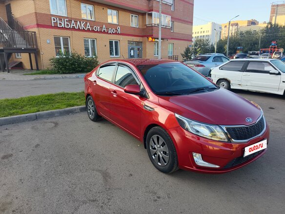 2012 Kia Rio 4-speed III, красный - вид 1
