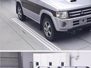 2010 Mitsubishi Pajero Mini II, серый, 688000 рублей, вид 1