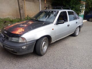 2002 Daewoo Nexia I, серый, 175000 рублей, вид 1