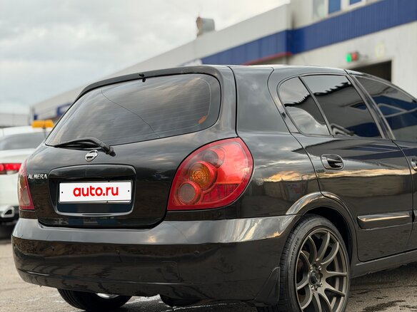 2004 Nissan Almera II (N16) Рестайлинг, чёрный - вид 5