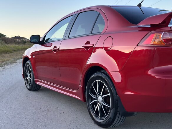 2007 Mitsubishi Lancer X, красный - вид 9