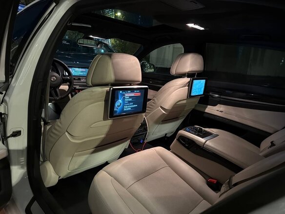 2012 BMW 7 серии 750i xDrive V (F01/F02/F04) Рестайлинг, белый, 1650000 рублей - вид 7