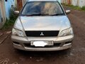 2001 Mitsubishi Lancer Cedia IX, серый, 420000 рублей - вид 1