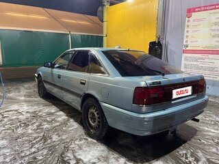 1989 Mazda 626 III (GD), голубой, 70000 рублей, вид 3