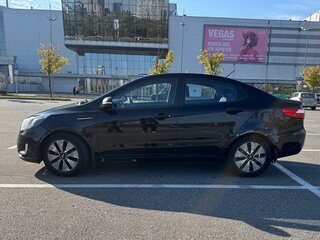 2011 Kia Rio 4-speed III, чёрный, 690000 рублей, вид 4