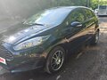2016 Ford Fiesta Mk6 Рестайлинг, чёрный, 619000 рублей - вид 1