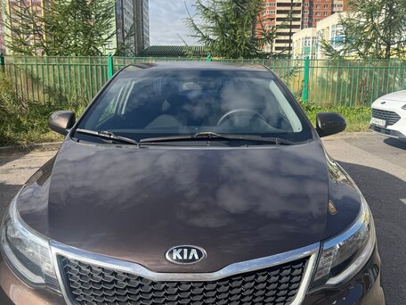 2015 Kia Rio III Рестайлинг, коричневый, 830000 рублей, вид 2