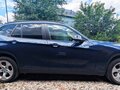 2014 BMW X1 20i I (E84) Рестайлинг, синий, 1700000 рублей - вид 2