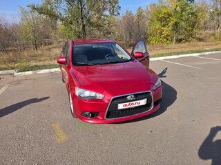 2013 Mitsubishi Lancer X Рестайлинг, красный, 850000 рублей, вид 1