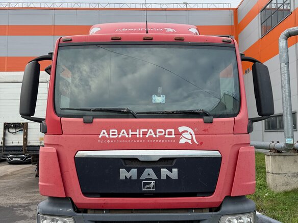 2010 MAN TGS, красный, 1300000 рублей - вид 2