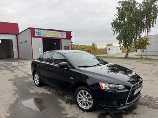 2012 Mitsubishi Lancer X Рестайлинг, чёрный, 850000 рублей, вид 1