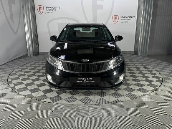 2014 Kia Rio 6-speed III, чёрный - вид 1