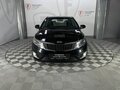 2014 Kia Rio 6-speed III, чёрный - вид 1