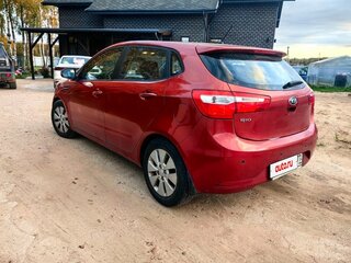 2014 Kia Rio 6-speed III, пурпурный, 1200000 рублей, вид 1