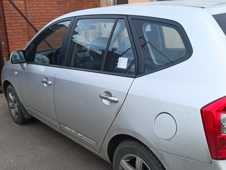 2009 Kia Carens II (UN), серый, вид 4