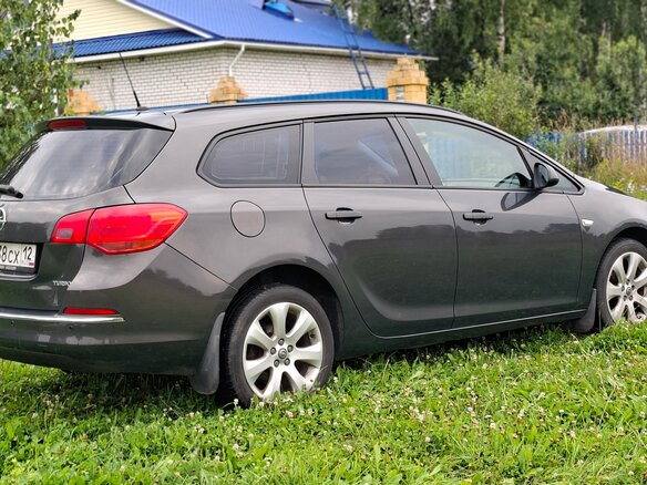 2013 Opel Astra J Рестайлинг, серый, 560000 рублей - вид 5