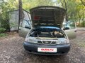 2005 Daewoo Nexia I, коричневый