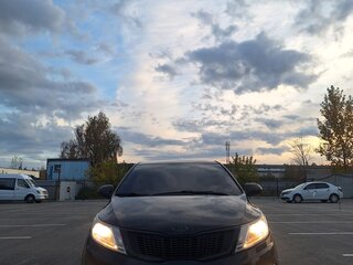 2012 Kia Rio 5-speed III, чёрный, 730000 рублей, вид 5