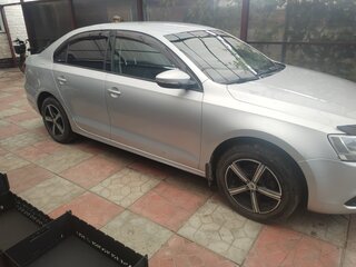 2013 Volkswagen Jetta VI, серебристый, 650000 рублей, вид 3