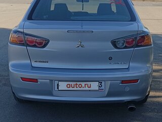 2009 Mitsubishi Lancer X, серебристый, 810000 рублей, вид 3