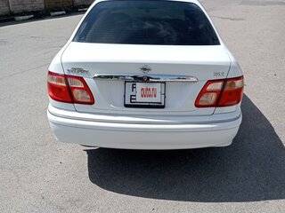 2001 Nissan Bluebird Sylphy I (G10), белый, 510000 рублей, вид 5