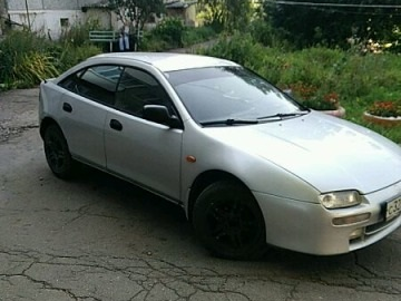 1996 Mazda 323 V (BA), серебристый