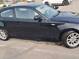 2010 BMW 1 серии 116i I (E81/E82/E87/E88) Рестайлинг, чёрный, 725000 рублей, вид 2
