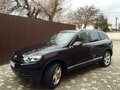 2013 Volkswagen Touareg II, чёрный - вид 2