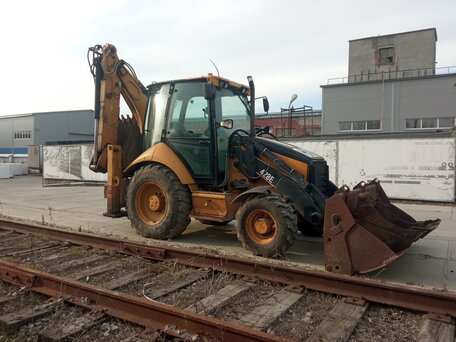 2006 Caterpillar 428, жёлтый, 3700000 рублей, вид 3