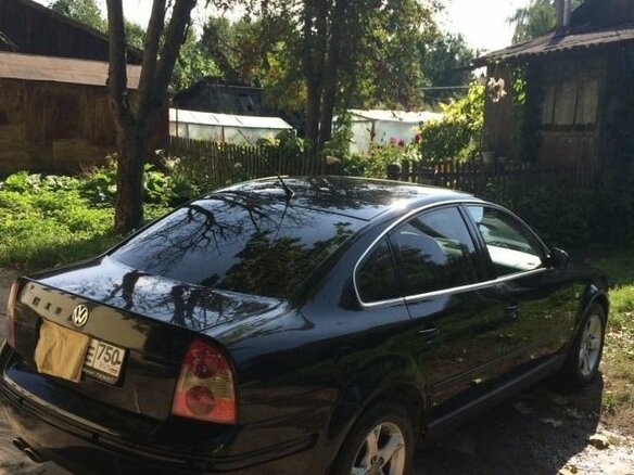 2002 Volkswagen Passat B5 Рестайлинг, чёрный - вид 1