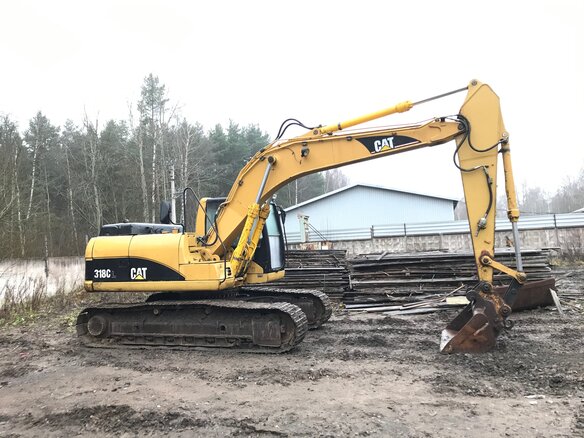 2006 Caterpillar 318, жёлтый - вид 1