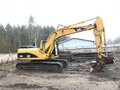 2006 Caterpillar 318, жёлтый - вид 1