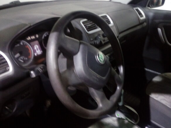 2009 Skoda Roomster I, пурпурный - вид 3