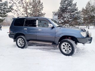 2005 Toyota Land Cruiser 105 100 Series Рестайлинг 1, синий, 4400000 рублей, вид 4