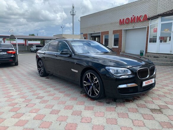 2011 BMW 7 серии 750i xDrive V (F01/F02/F04), чёрный, 2500000 рублей - вид 4