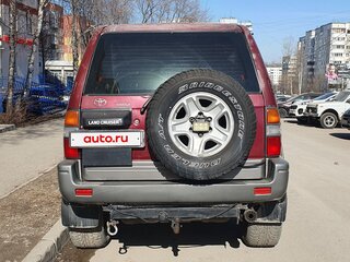 1997 Toyota Land Cruiser Prado 90 Series, красный, 990000 рублей, вид 3
