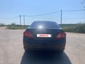 2008 Toyota Corolla X (E140, E150), чёрный - вид 3